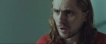 Movie still from “Borg vs. McEnroe” (2017), directed by Janus Metz – A person with long hair; Close Up shot, Over the shoulder angle