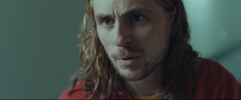 Movie still from “Borg vs. McEnroe” (2017), directed by Janus Metz – A person with long hair; Close Up shot, Low angle