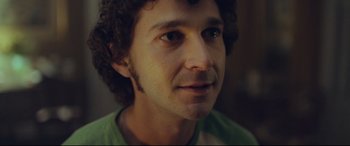 Movie still from “Borg vs. McEnroe” (2017), directed by Janus Metz – A person wearing a green shirt; Close Up shot, Over the shoulder angle