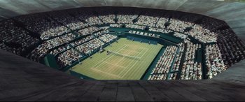 Movie still from “Borg vs. McEnroe” (2017), directed by Janus Metz – A tennis court with a lot of people in it; Extreme Wide shot, Overhead angle