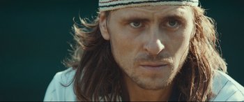 Movie still from “Borg vs. McEnroe” (2017), directed by Janus Metz – A person with long brown hair; Close Up shot, Low angle