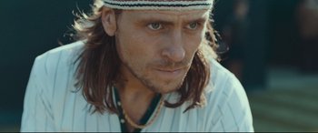Movie still from “Borg vs. McEnroe” (2017), directed by Janus Metz – A person with long hair; Close Up shot, Over the shoulder angle