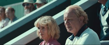 Movie still from “Borg vs. McEnroe” (2017), directed by Janus Metz – A man and a woman standing next to each other; Close Up shot, Low angle
