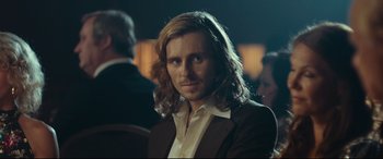 Movie still from “Borg vs. McEnroe” (2017), directed by Janus Metz – A person with long hair; Close Up shot, Over the shoulder angle