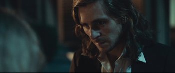Movie still from “Borg vs. McEnroe” (2017), directed by Janus Metz – A person with long hair; Close Up shot, Over the shoulder angle