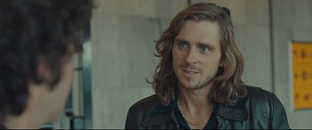 Movie still from “Borg vs. McEnroe” (2017), directed by Janus Metz – A person with long brown hair; Close Up shot, Over the shoulder angle