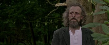 A man with long hair and a white beard