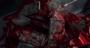 Movie still from “Bound” (1996), directed by Lilly Wachowski – A pile of money that has blood on it; Extreme Close Up shot, High angle
