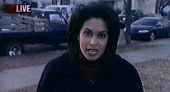 Movie still from “Bowling for Columbine” (2002), directed by Michael Moore – A person wearing a jacket; Close Up shot, High angle