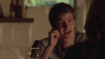 Movie still from “Boy A” (2007), directed by John Crowley – A man sitting in front of a glass of wine; Close Up shot, Over the shoulder angle