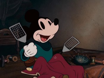 Movie still from “Brave Little Tailor” (1938), directed by Burt Gillett – A mickey mouse cartoon character sitting in a room; Medium shot, Low angle