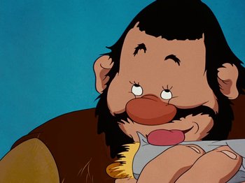 Movie still from “Brave Little Tailor” (1938), directed by Burt Gillett – An animated picture of a man with long hair and a beard; Close Up shot, Low angle