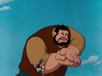 Movie still from “Brave Little Tailor” (1938), directed by Burt Gillett – An animated picture of a man in a brown shirt; Medium shot, Low angle