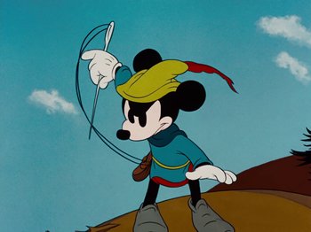 Movie still from “Brave Little Tailor” (1938), directed by Burt Gillett – A cartoon of a mickey mouse holding a kite; Medium shot, Low angle