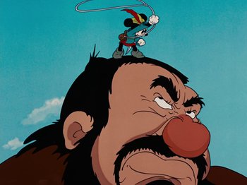 Movie still from “Brave Little Tailor” (1938), directed by Burt Gillett – An animated picture of an old man and a goofy character; Close Up shot, Low angle