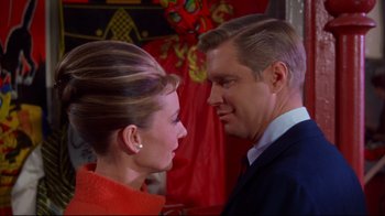 Movie still from “Breakfast at Tiffany's” (1961), directed by Blake Edwards – A man and a woman standing next to each other; Close Up shot, Low angle