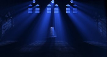 Movie still from “Bride of Chucky” (1998), directed by Ronny Yu – A dark room with some windows and lights in it; Extreme Wide shot, Low angle