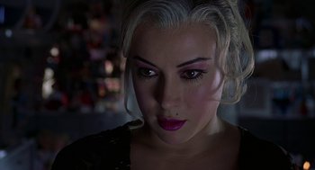 Movie still from “Bride of Chucky” (1998), directed by Ronny Yu – A person wearing a black shirt; Close Up shot, High angle