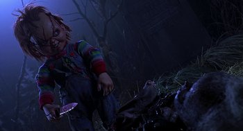 Movie still from “Bride of Chucky” (1998), directed by Ronny Yu – A child's play character is in the dark; Medium shot, Low angle
