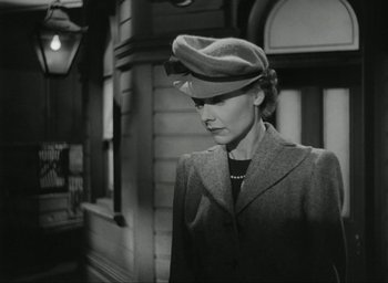 Movie still from “Brief Encounter” (1945), directed by David Lean – A black and white photo of a woman wearing a hat; Close Up shot, Low angle