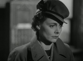 Movie still from “Brief Encounter” (1945), directed by David Lean – An old photo of a woman wearing a hat; Close Up shot, Low angle