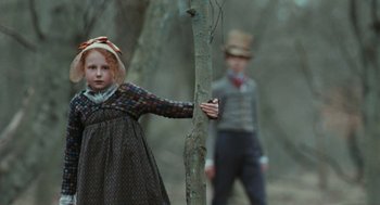Movie still from “Bright Star” (2009), directed by Jane Campion – A young girl holding a tree in front of a young man; Medium shot, Over the shoulder angle