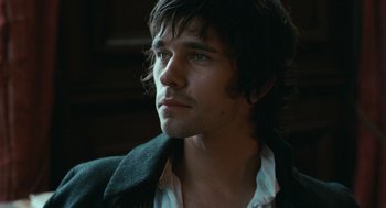 Movie still from “Bright Star” (2009), directed by Jane Campion – A person wearing a jacket; Close Up shot, High angle