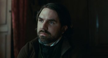 Movie still from “Bright Star” (2009), directed by Jane Campion – A person with a beard; Close Up shot, Over the shoulder angle