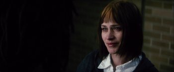 Movie still from “Bringing Out the Dead” (1999), directed by Martin Scorsese – A person wearing a jacket; Close Up shot, Over the shoulder angle