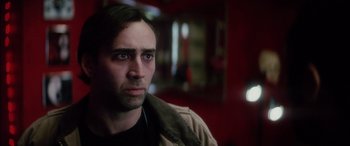 Movie still from “Bringing Out the Dead” (1999), directed by Martin Scorsese – A person wearing a jacket; Close Up shot, Low angle