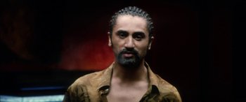 Movie still from “Bringing Out the Dead” (1999), directed by Martin Scorsese – A person wearing a shirt; Close Up shot, High angle