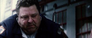 Movie still from “Bringing Out the Dead” (1999), directed by Martin Scorsese – A person wearing a jacket; Close Up shot, Low angle