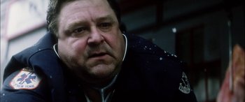 Movie still from “Bringing Out the Dead” (1999), directed by Martin Scorsese – A person wearing a jacket; Close Up shot, Low angle