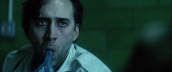 Movie still from “Bringing Out the Dead” (1999), directed by Martin Scorsese – A person with a toothbrush in his mouth; Close Up shot, Low angle