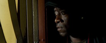 Movie still from “Brooklyn's Finest” (2009), directed by Antoine Fuqua – A person wearing a hat; Close Up shot, Low angle