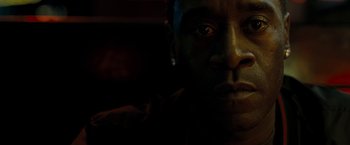Movie still from “Brooklyn's Finest” (2009), directed by Antoine Fuqua – A man's face in the dark; Extreme Close Up shot, Low angle