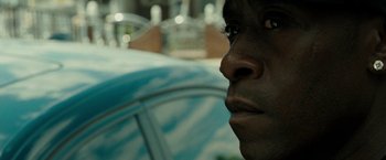 Movie still from “Brooklyn's Finest” (2009), directed by Antoine Fuqua – A man's face in front of a car; Extreme Close Up shot, Over the shoulder angle