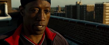 Movie still from “Brooklyn's Finest” (2009), directed by Antoine Fuqua – A person wearing a hat; Close Up shot, Low angle