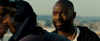 Movie still from “Brooklyn's Finest” (2009), directed by Antoine Fuqua – A person talking to another person; Close Up shot, Over the shoulder angle