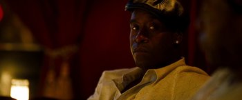 Movie still from “Brooklyn's Finest” (2009), directed by Antoine Fuqua – A person wearing a hat; Close Up shot, Over the shoulder angle