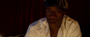 Movie still from “Brooklyn's Finest” (2009), directed by Antoine Fuqua – A person wearing a hat; Close Up shot, Low angle