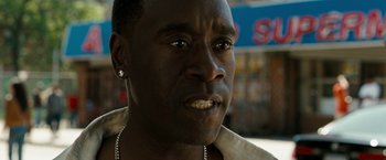 Movie still from “Brooklyn's Finest” (2009), directed by Antoine Fuqua – A person wearing a shirt; Close Up shot, Over the shoulder angle