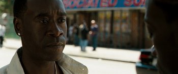 Movie still from “Brooklyn's Finest” (2009), directed by Antoine Fuqua – A man's face on the sidewalk; Close Up shot, Over the shoulder angle