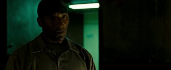 Movie still from “Brooklyn's Finest” (2009), directed by Antoine Fuqua – A person wearing a uniform; Close Up shot, Low angle