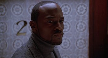 Movie still from “Brown Sugar” (2002), directed by Rick Famuyiwa – A person wearing a jacket; Close Up shot, Low angle