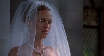 Movie still from “Brown Sugar” (2002), directed by Rick Famuyiwa – A woman wearing a wedding veil and a necklace; Close Up shot, Over the shoulder angle