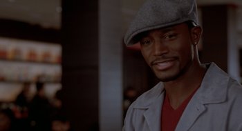 Movie still from “Brown Sugar” (2002), directed by Rick Famuyiwa – A person wearing a hat; Close Up shot, High angle