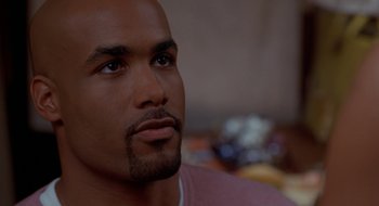 Movie still from “Brown Sugar” (2002), directed by Rick Famuyiwa – A man's face looking upward; Close Up shot, High angle