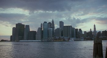Movie still from “Brown Sugar” (2002), directed by Rick Famuyiwa – A view of a city skyline from across the water; Extreme Wide shot, High angle