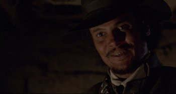 Movie still from “Buck and the Preacher” (1972), directed by Joseph Sargent – A person wearing a hat; Close Up shot, Low angle